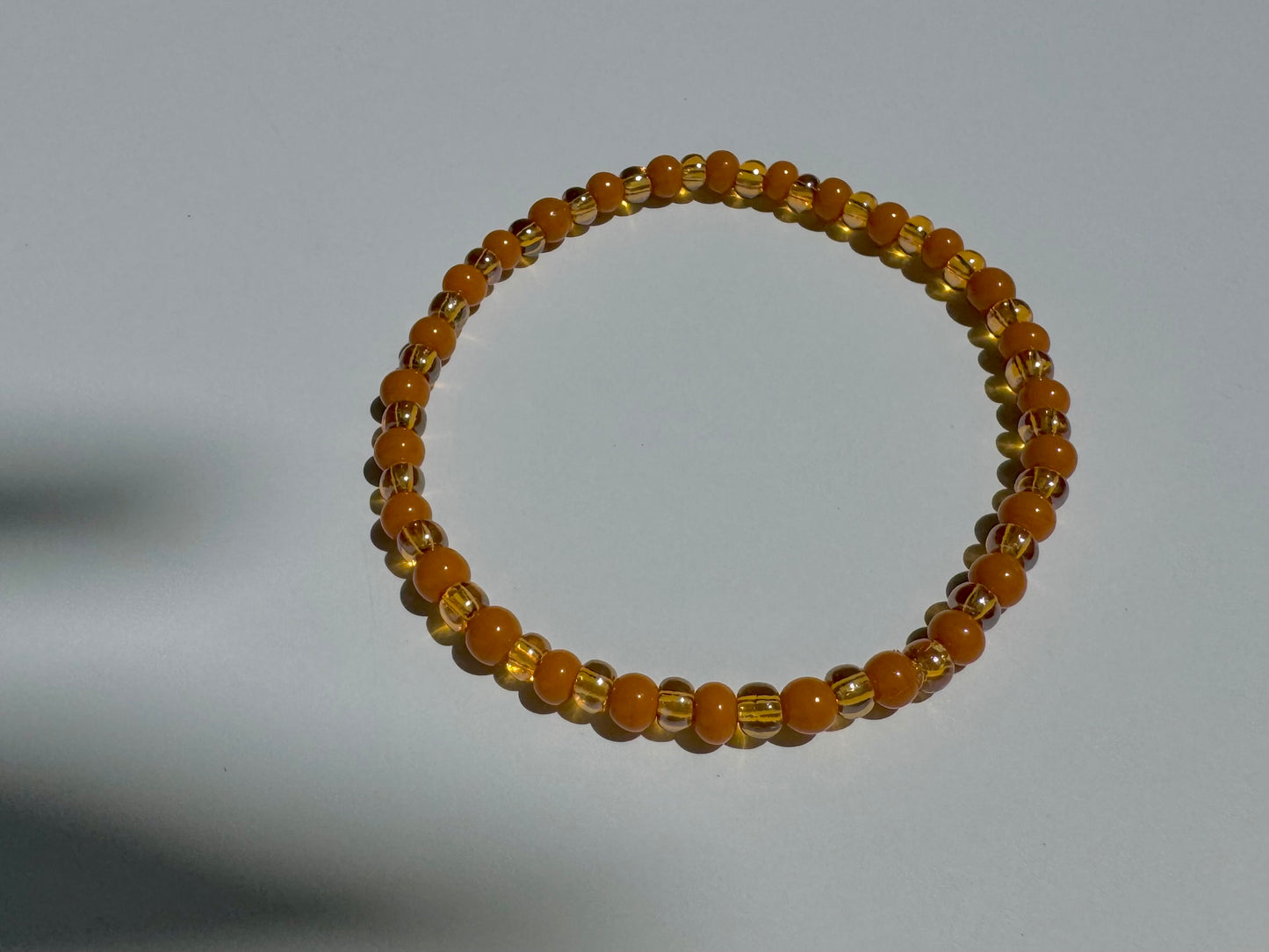 "Tangerine, Tangerine" Upcycled Beaded Stretch Bracelet (1/1)